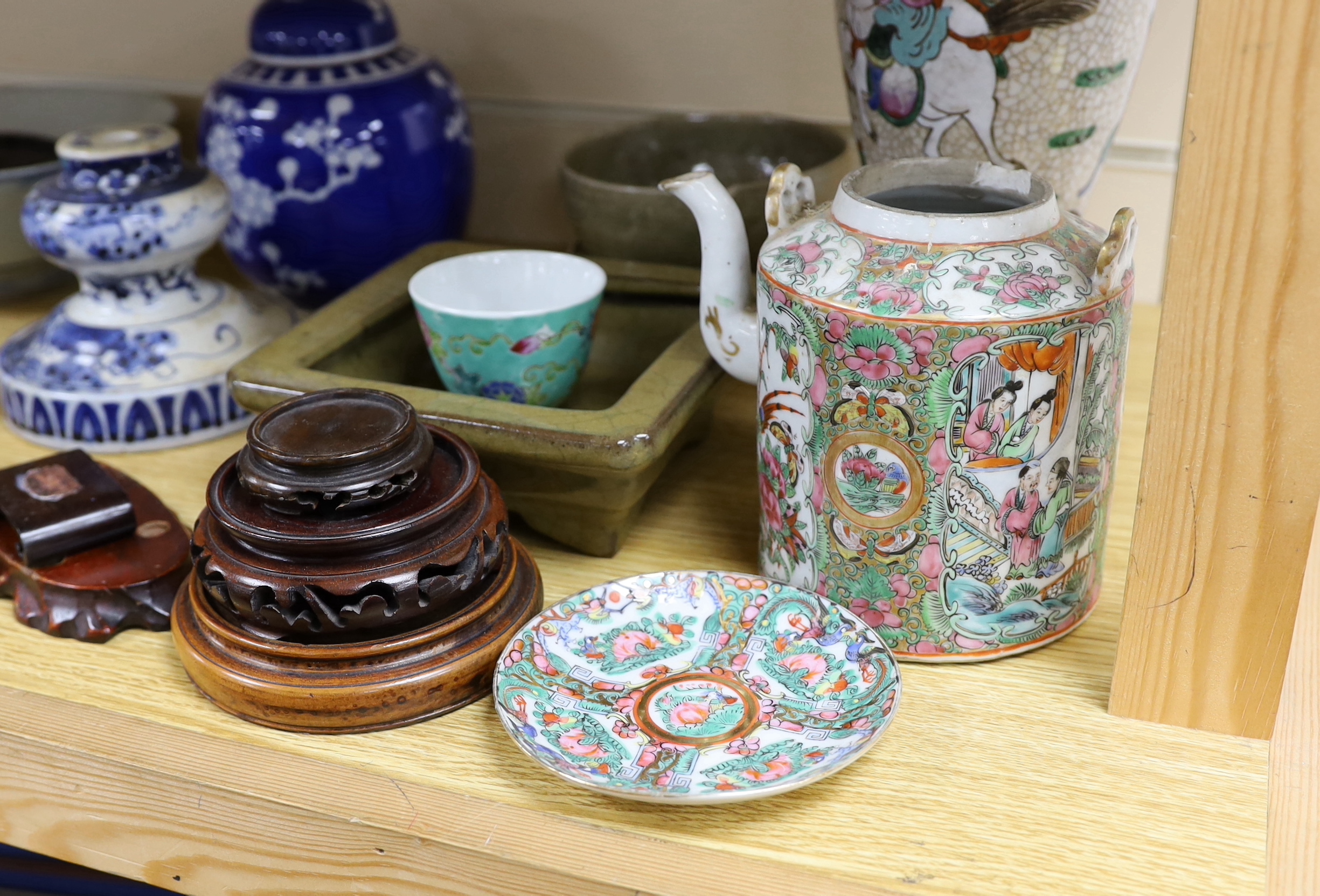 A collection of Chinese hardwood stands and a soapstone example, largest 29cm wide